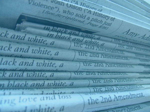 A bundle of newspapers to identify news